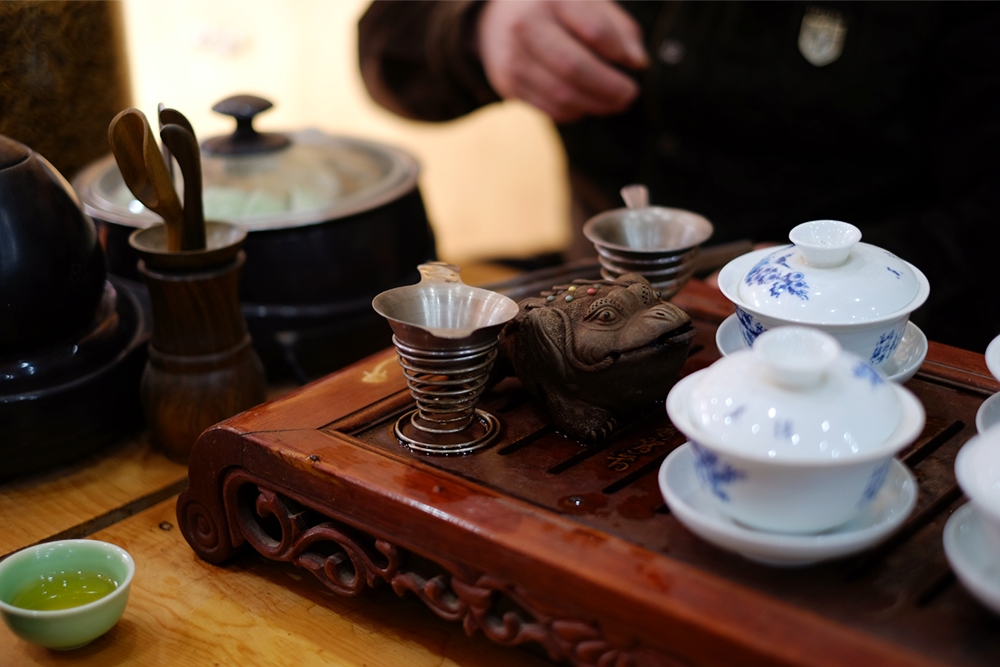 Trying tea. Love the little ceremony, familiar to me from my wing chun classes. Yes, we do tea breaks, love that